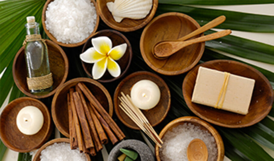 Thai spa accessories — herbs, oils and warm bowls